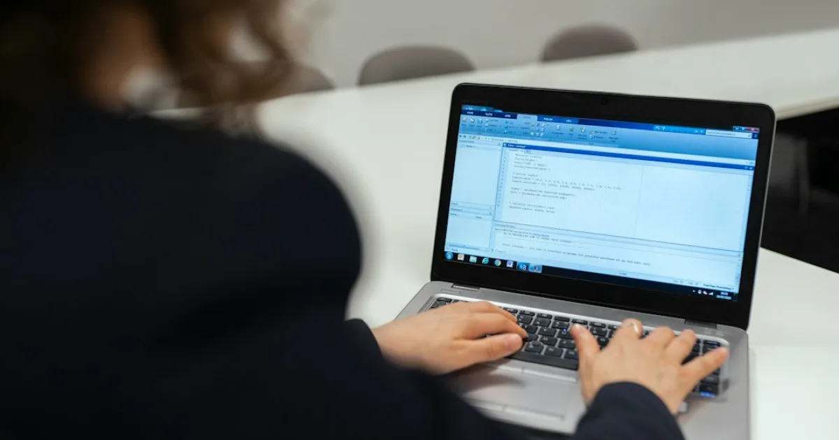 Person filing trademark renewal documents online using an office computer